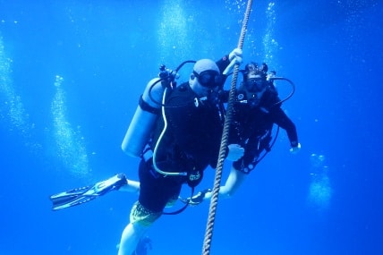 Sara Foz SCUBA diving with Josh